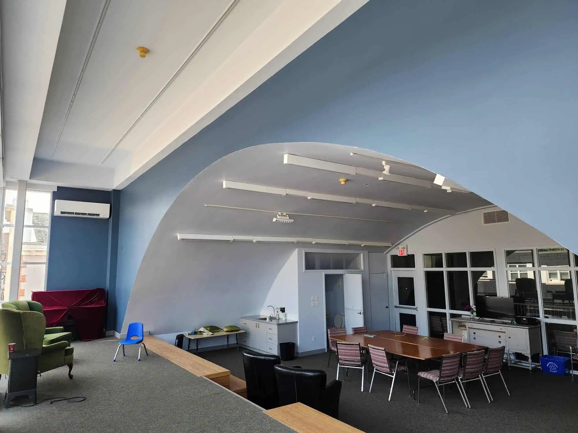 Commercial office interior with painted walls and finished workspaces
