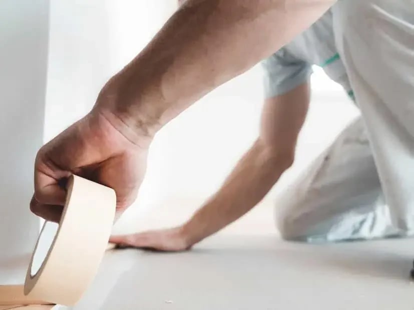 Masking an edge to protect adjacent surfaces before painting